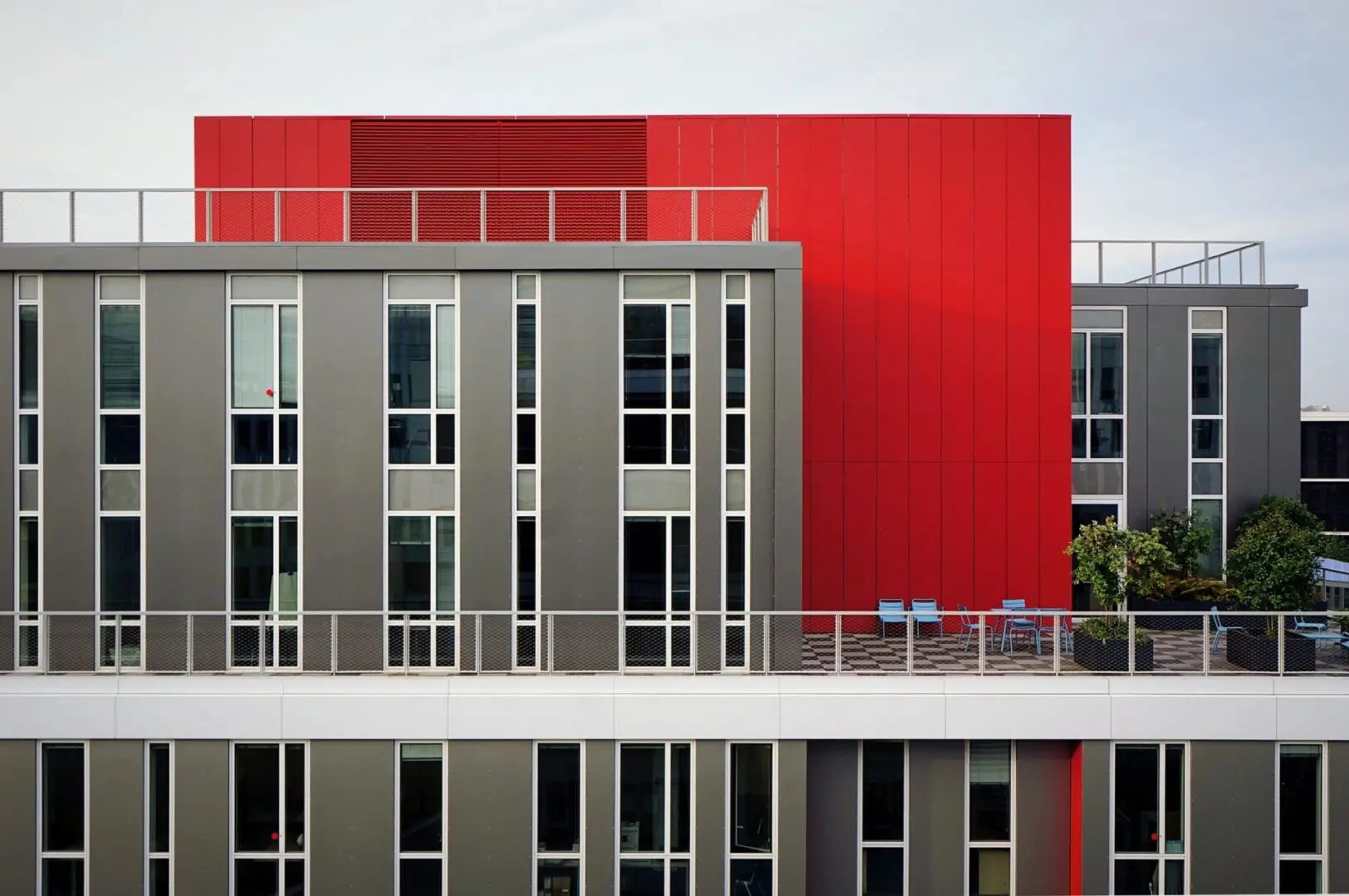 Modern Living / Red and White Commercial Building